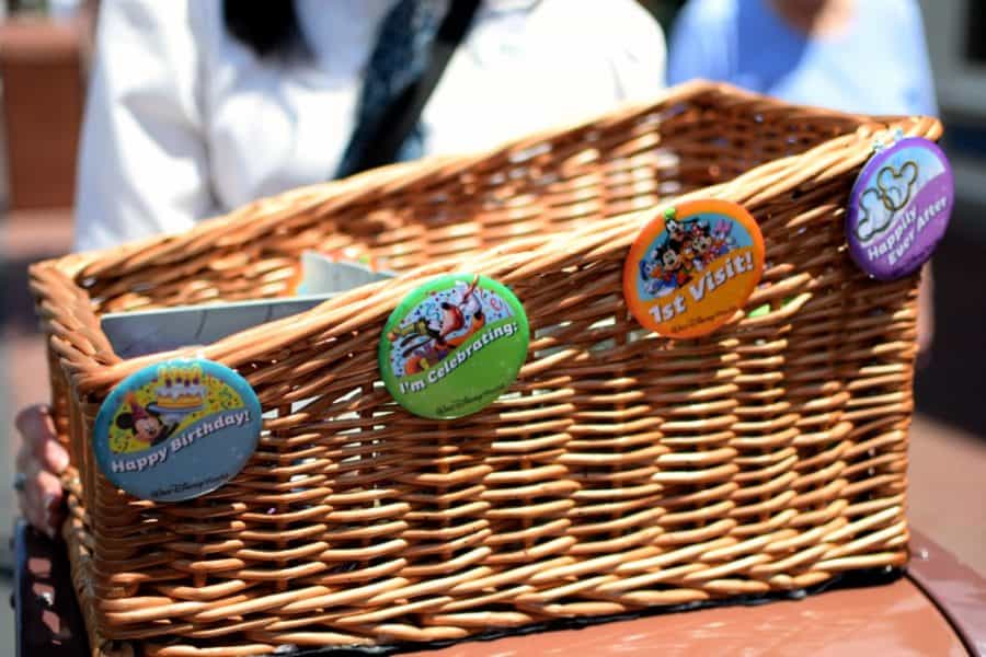 Celebration buttons can be found in trhe WDW parks and at resort front desks. They're a great way to enhance your vacation for free!