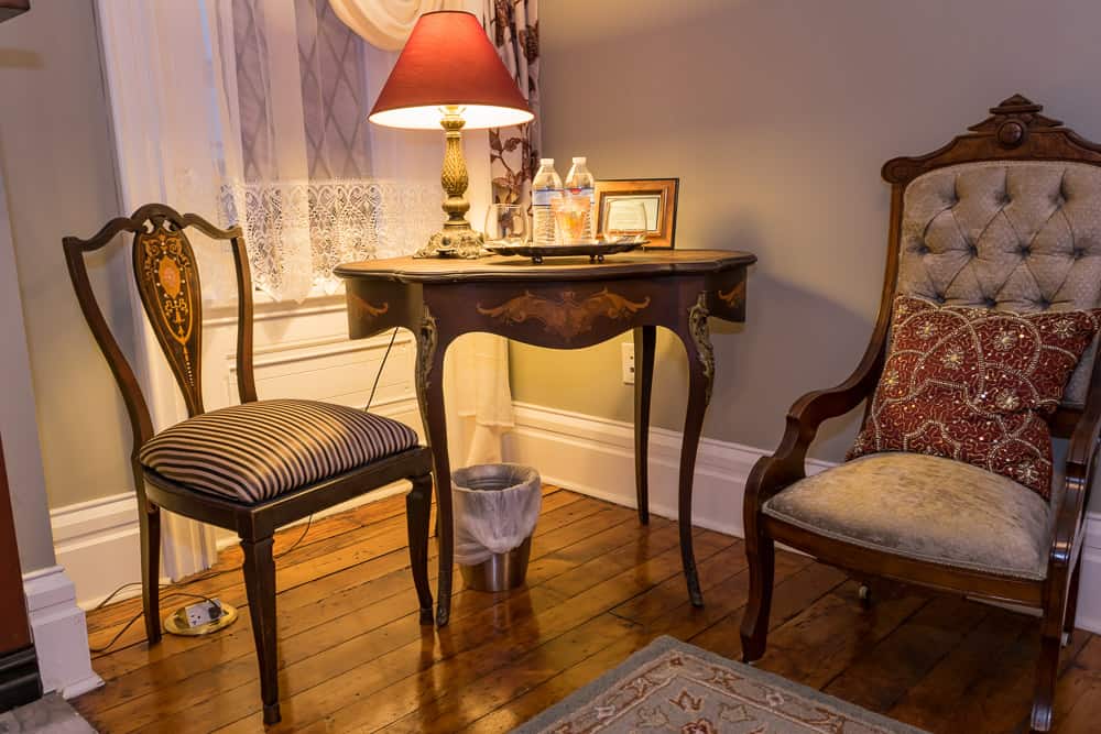 A beautiful antique side table at The Allegheny Inn.