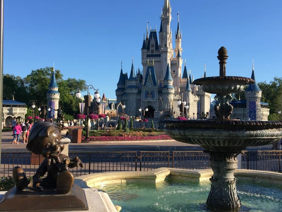 The Hub area of Magic Kingdom is filled with grassy spots and places to relax