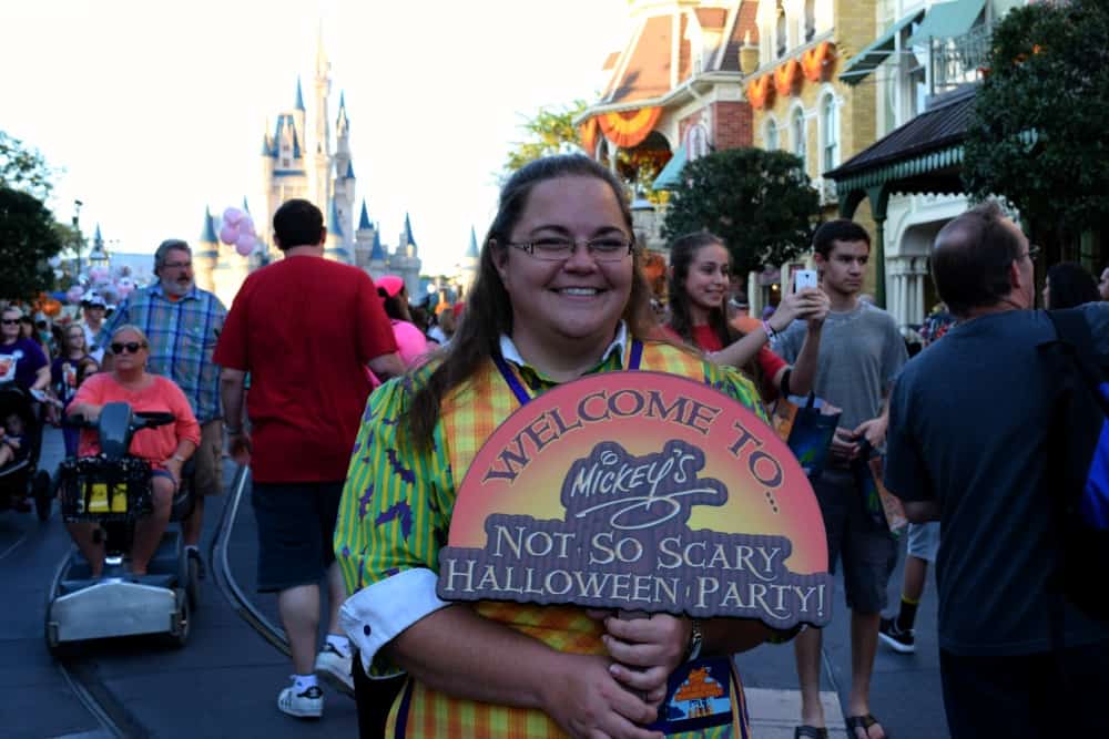 Mickey's Not-So-Scary Halloween Party Tips and Hacks- Castmember holding sign