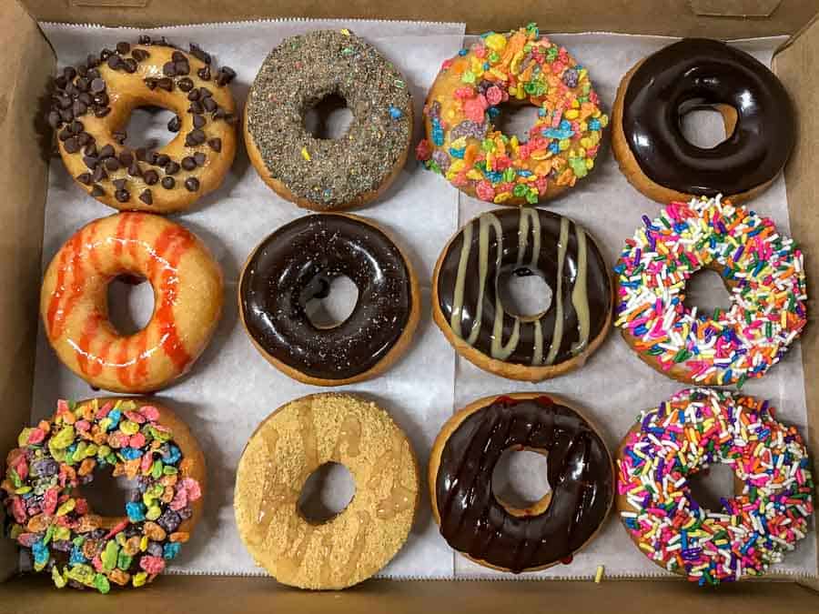 Where to eat in Clearwater Beach: A dozen donuts, freshly made, at The Donut Experiment in Clearwater Beach. 