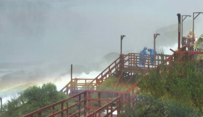 There are plenty of stairs to get to the Hurricane Deck at Cave of the Winds. Photo Credit: Karyn Locke