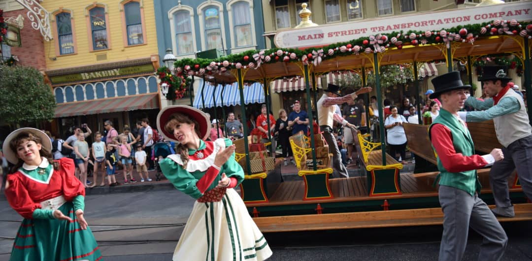 The Main Street Trolley Show in Magic Kingdom is fun any time of year, but it's even more special at Christmastime. Photo Credit: Steven Locke