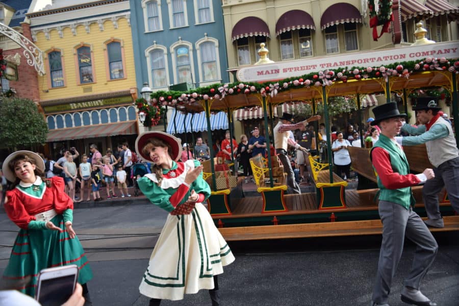 The Main Street Trolley Show in Magic Kingdom is fun any time of year, but it's even more special at Christmastime. Photo Credit: Steven Locke