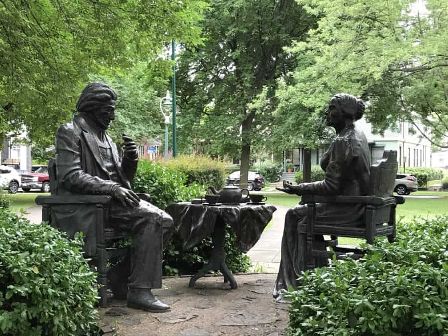 Frederick Douglass and Susan B. Anthony depicted in the sculpture "Let's Have Tea" in Rochester. 