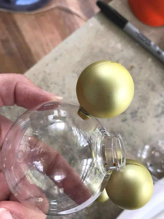 DIY Disney Halloween Ornaments_ Mickey Jack-o’-Lantern drilling holes