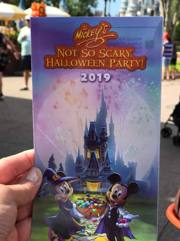 must-dos at Mickey's Not-So-Scary Halloween Party at Disney World: look over the party guide before you go.