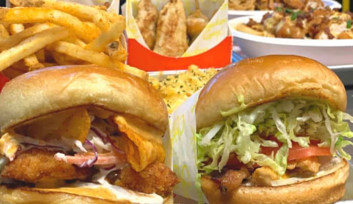 best Quick Service Restaurants at Disney World - Chicken Guy! Sandwiches: Bourbon Brown BBQ on left, Big Bite B.L.A.T on right.