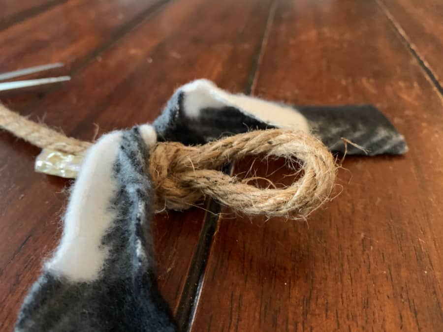 DIY Buffalo Check rag garland tying knots in rags