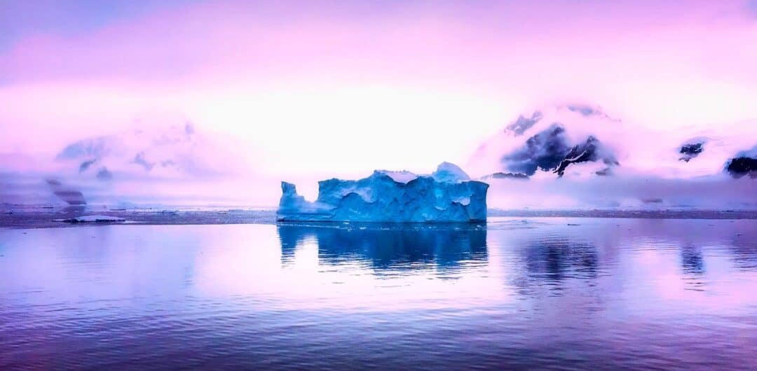 Easy Ways to Log Off and Reconnect with Nature 1 post pandemic travel planning antarctica beautiful sky and iceberg