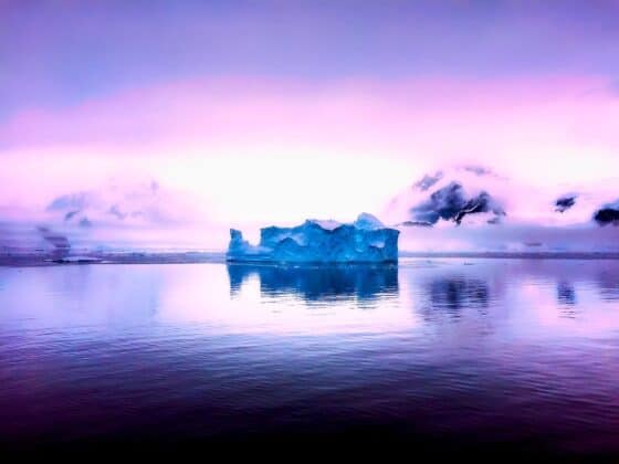 post pandemic travel planning antarctica beautiful sky and iceberg