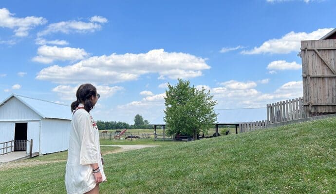 sauder village with kids  - barn with sky