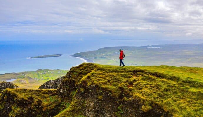 How To Prepare for Your First Hiking Trip - girl looking at meadow