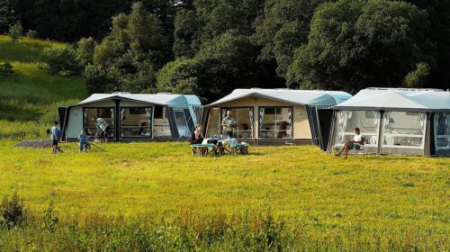 Glamping Is Not Camping - What’s the Difference Between Camping and Glamping - three luxury tents