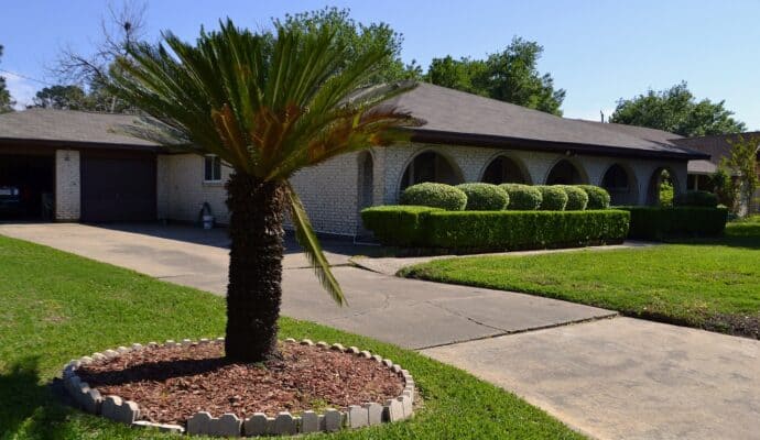 How To Cover Patches of Dirt in Your Yard - use mulch to cover