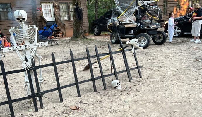 Lake Rudolph is the best RV park for Halloween - skeleton on fence