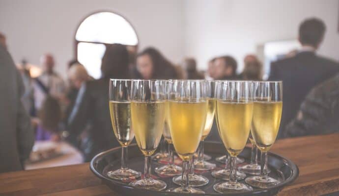 6 Practical Tips for Organizing a Great Event - champagne on a tray
