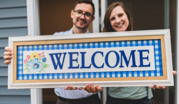 Things To Do Before Moving Into a New House - new house sign