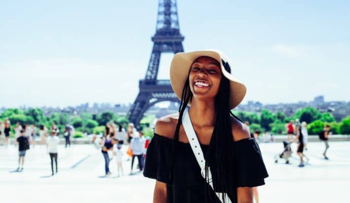 language holidays as a student - eiffel tower with girl smiling