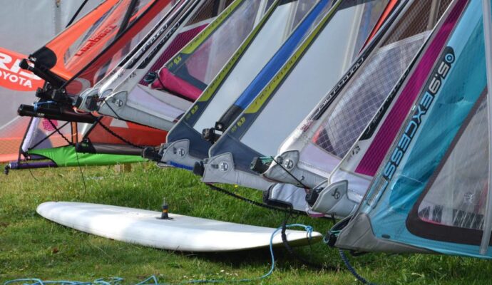 Tips for Choosing Your First Windsurf Board - colorful windsurf sails
