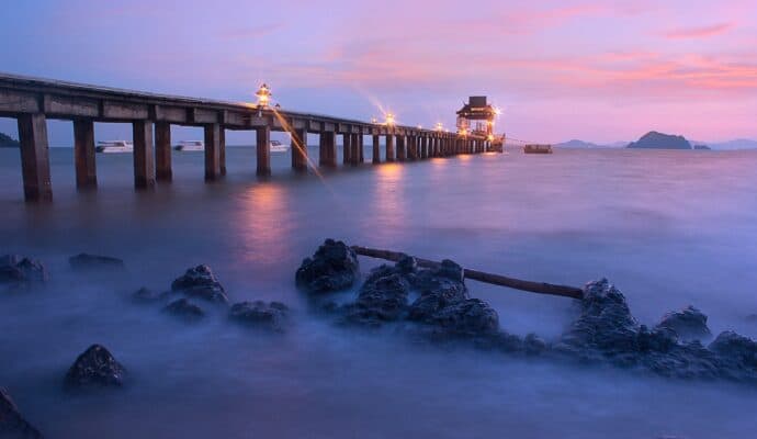 is costco travel worth it? Calm beach with pier