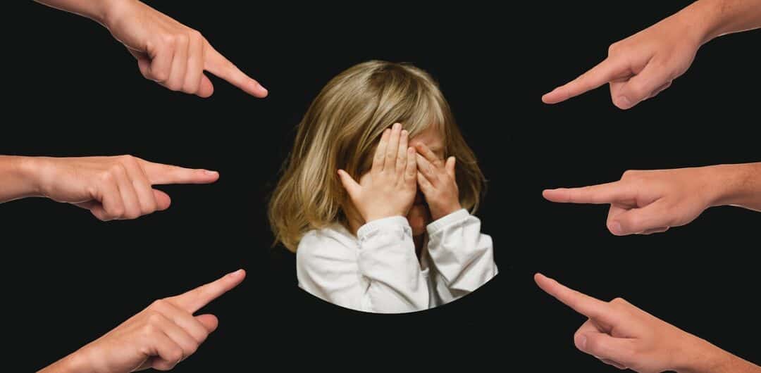 Making Your Child Feel Happy and Secure During a Divorce - child blames themselves
