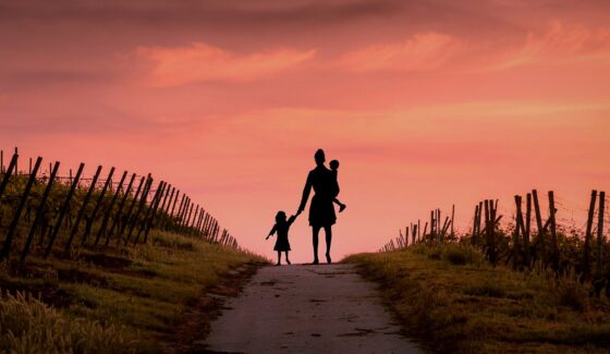 Making Your Child Feel Happy and Secure During a Divorce - mother with children at sunset