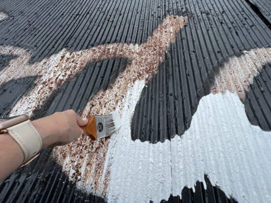 see rock city barns 90th anniversary - painting a barn roof