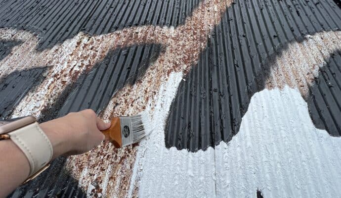 see rock city barns 90th anniversary - painting a barn roof