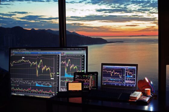 Binary Options Journey- Learning Safe Strategies for Beginners - laptop with graph