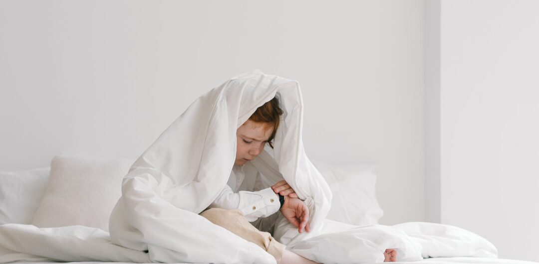Parenting in the Digital Age- child under blanket