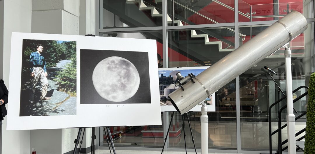 Daniel Kamin's telescope and photos of him as a young man and of the moon. 