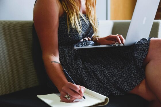 Have You Planned Your Next Trip Well Enough? Woman taking notes on computer