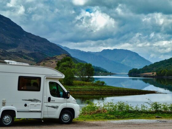 RV Travel safety tips - How to Prepare for Your First RV Trip - camper van with mountains