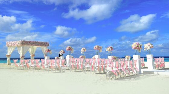 Make Your Destination Wedding Really Shine - beach wedding with chairs set up