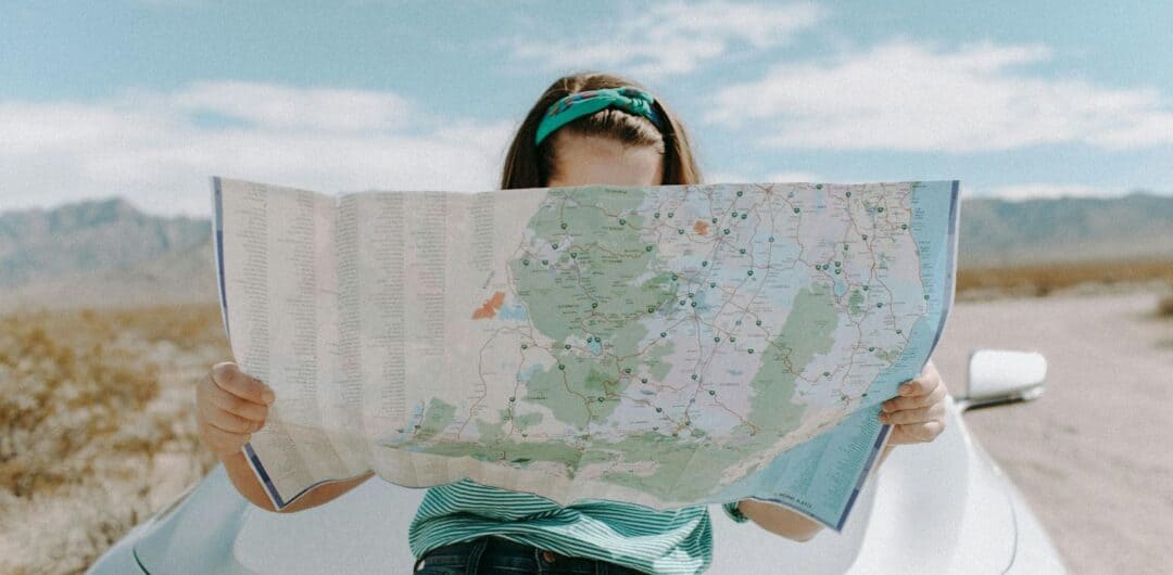 Love Adventure? Here’s Why You Should Buy an RV 2 Love Adventure? Here’s Why You Should Buy an RV - Woman With Map