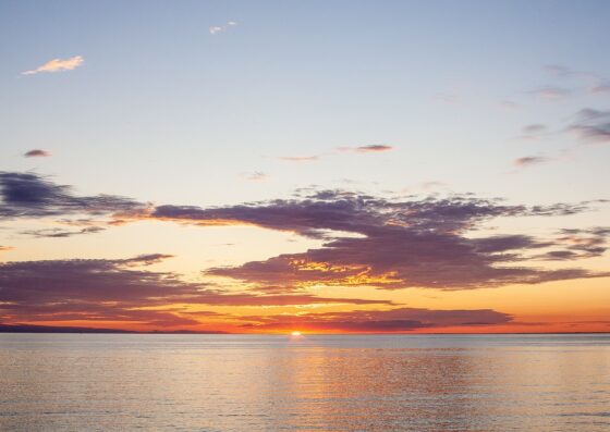 The 10 Best Fall Road Trips in the US - Door County Sun Set