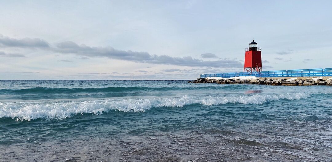 The 10 Best Fall Road Trips in the US - Lighthouse on Lake Michigan