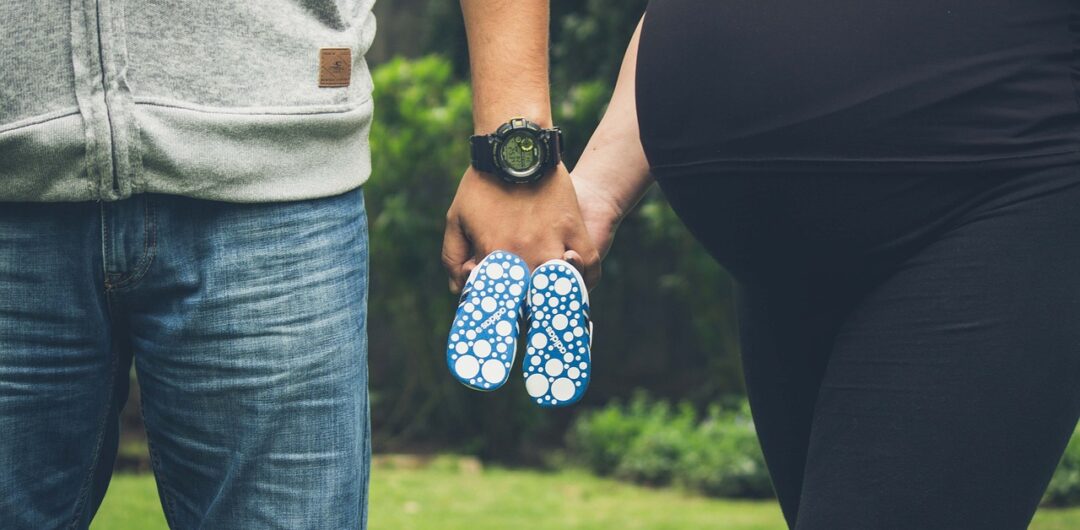 Comfortable Maternity Pants Every Mom Needs for Travel 2 Comfortable Maternity Pants Every Mom Needs for Travel - Family Holding Baby Shoes
