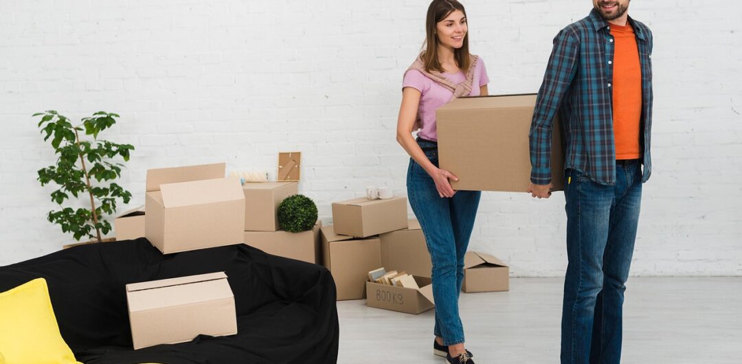 Essential Packing Hacks for a Long-Distance Move - Couple Moving Boxes
