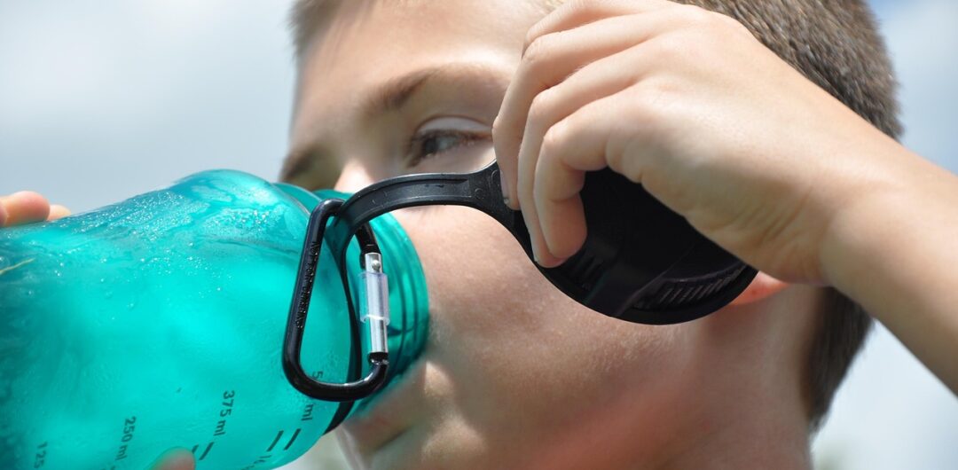Hydration and Its Profound Effects on the Body - Little Boy Drinking Water