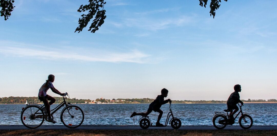 5 Ideas for Your 2026 Family Break 5 Must-Know Tips For A Fun Family Cycling Holiday - Family Biking by Water