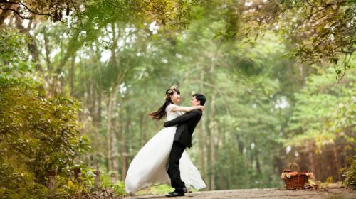 The Best Bridal Hair and Makeup Teams for Outdoor Weddings - Happy Wedding Couple in Woods