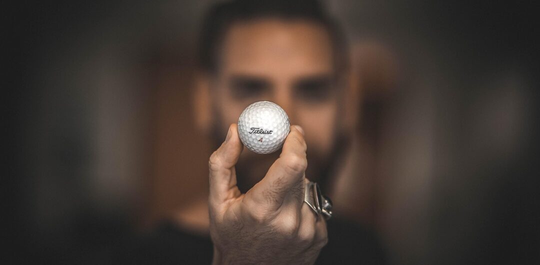 Transform Your Family Time With Indoor Golf Fun 3 Transform Your Family Time With Indoor Golf Fun - Man Holding Golf Ball