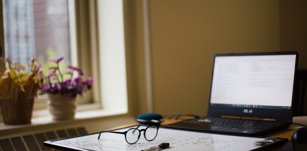 How To Plan a Summer Trip With More Space, Less Stress, and Zero Crowds 3 5 Tips for Getting the Most Value from Aurora Apartment Layouts - Apartment Laptop by Window