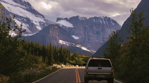 Could A Road Trip Be Your Next Travel Adventure - Car with Mountain View