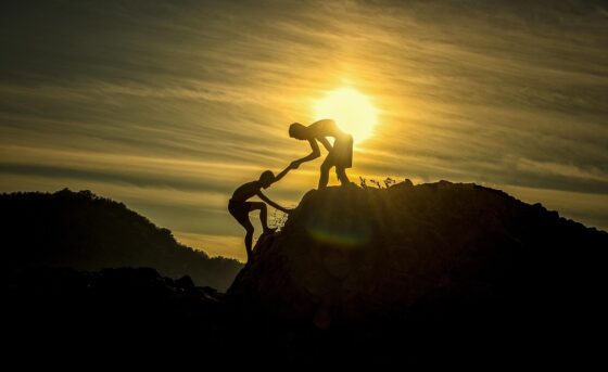Minimalist Living How Cutting Excess Brings Peace of Mind - People Climbing a Hill
