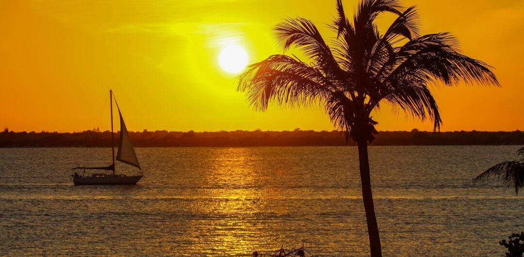 4 Easy Tips for Planning a Seamless Multi-Island Caribbean Escape 6 Tips for Planning a Seamless Multi-Island Caribbean Escape - Sunset Sailboat
