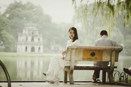 Why Constant Travel Might not be Attractive to a Potential Partner - Unhappy Couple