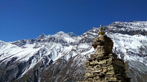 4 Must-Do Adventures During Your Time in Nepal - Buddhist Stupa in the Nepal Mountain